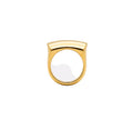 Gold ring with a white stone on a white background