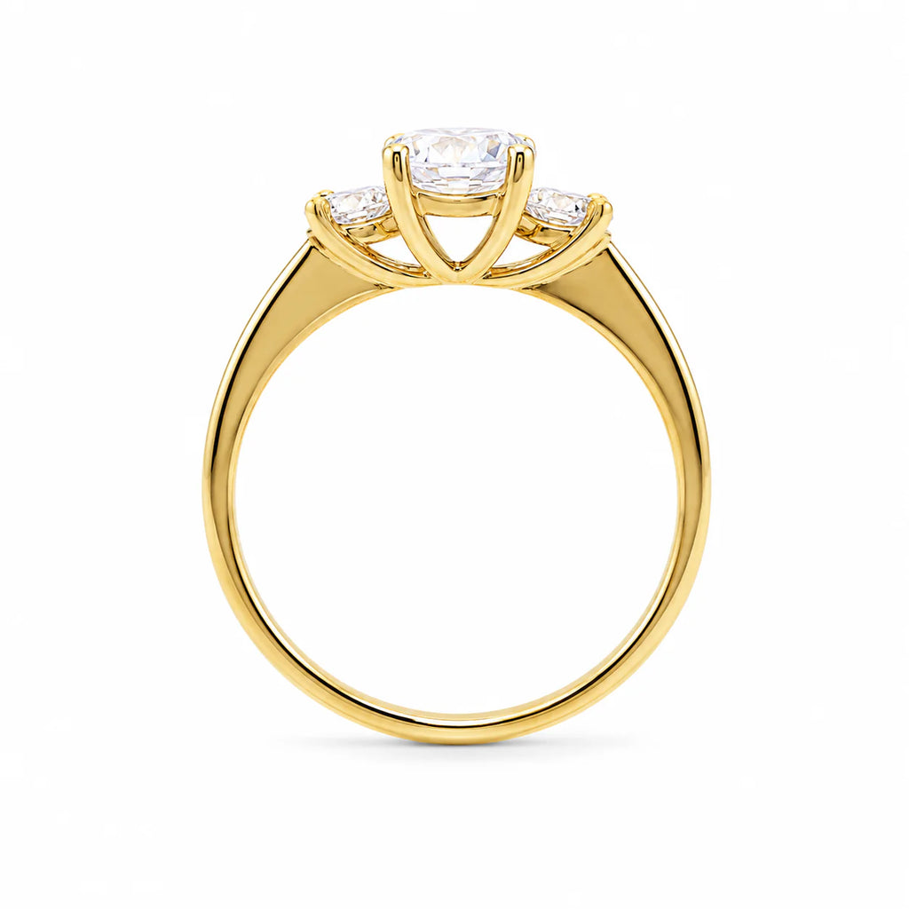 Gold ring with a diamond on a white background