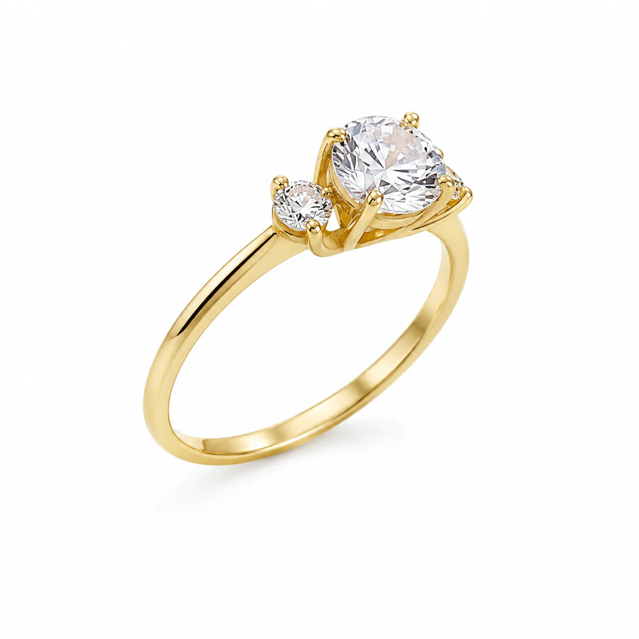 Gold ring with three diamonds on a white background