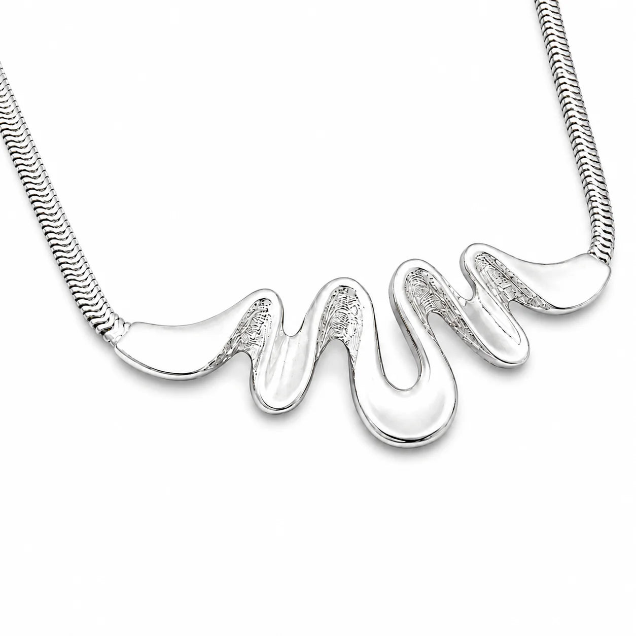 Silver necklace with a wavy pendant on a white background