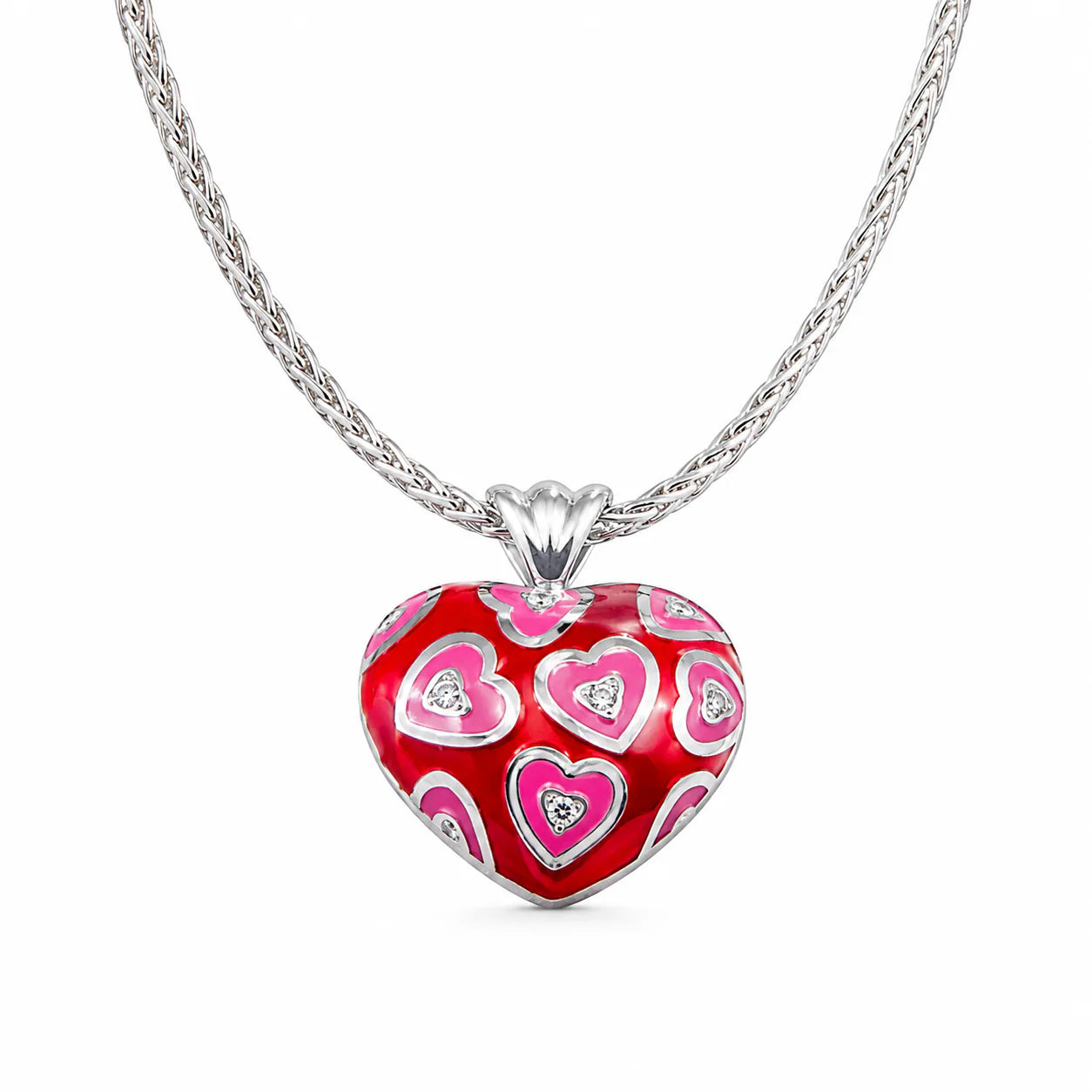 Heart-shaped pendant with red and pink design on a silver chain against a white background