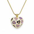 Heart-shaped pendant with gold, purple, and lilac design on a white background