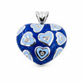 Heart-shaped pendant with blue and silver design on a white background