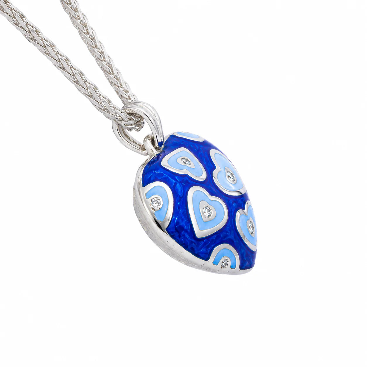 Blue heart-shaped pendant with silver chain on a white background
