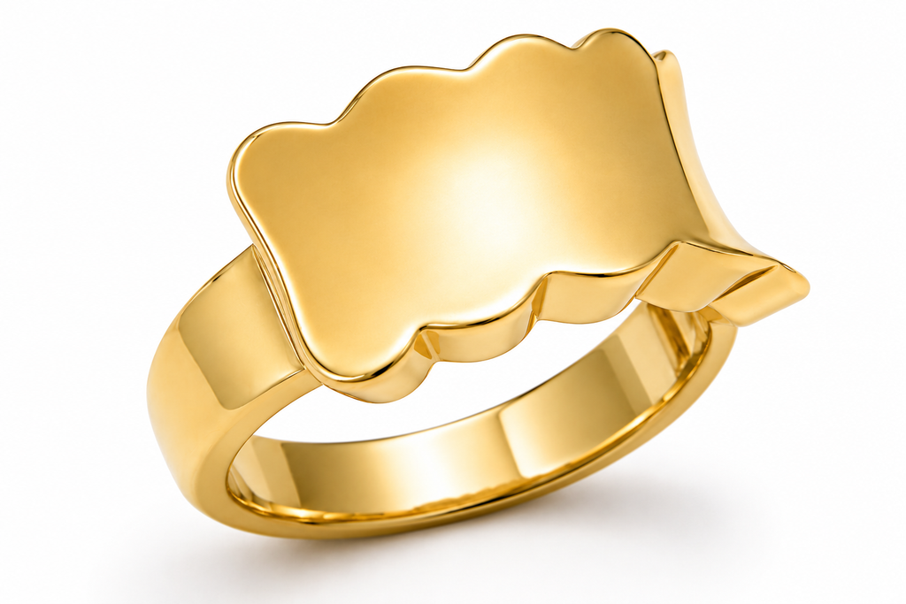 Gold ring with a unique design on a white background