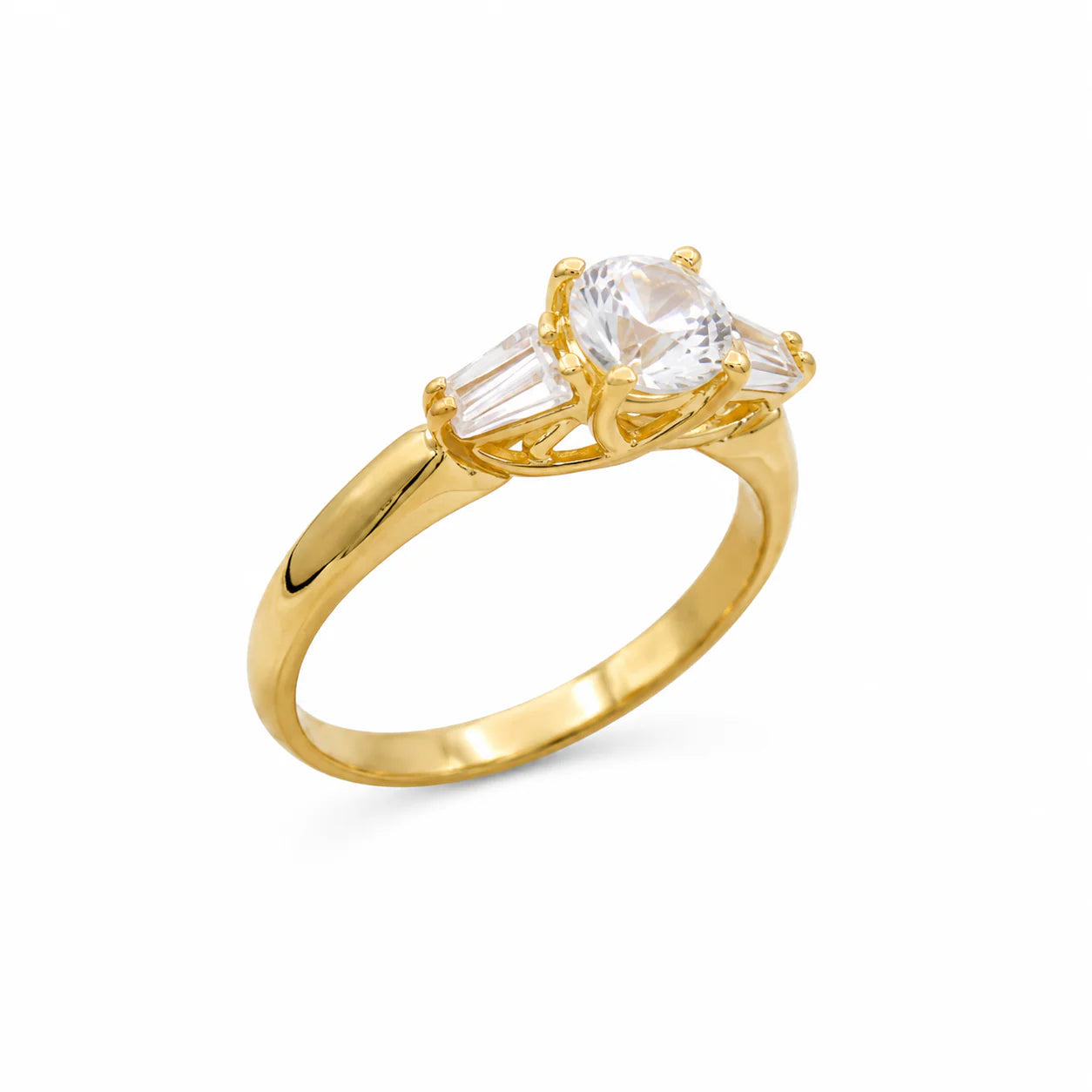 Gold ring with a clear gemstone on a white background