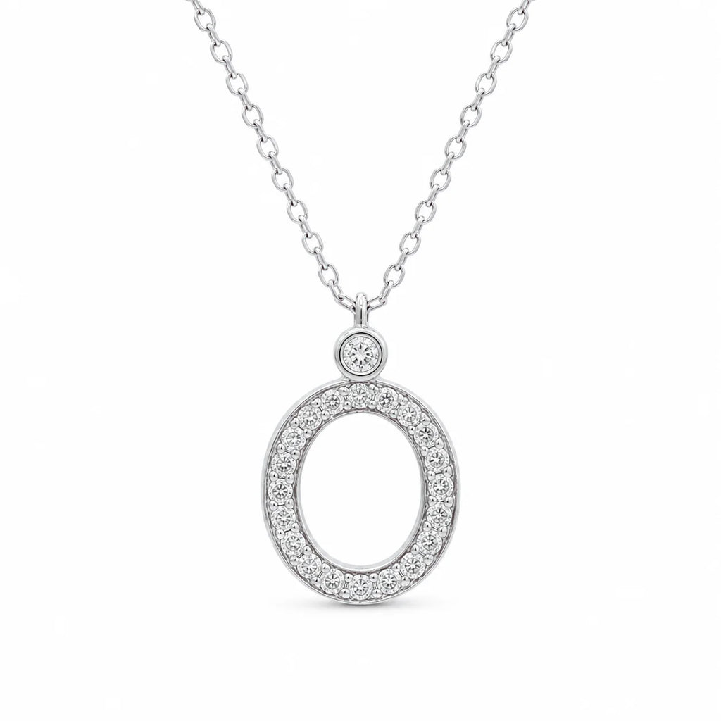 Silver necklace with an oval pendant on a white background