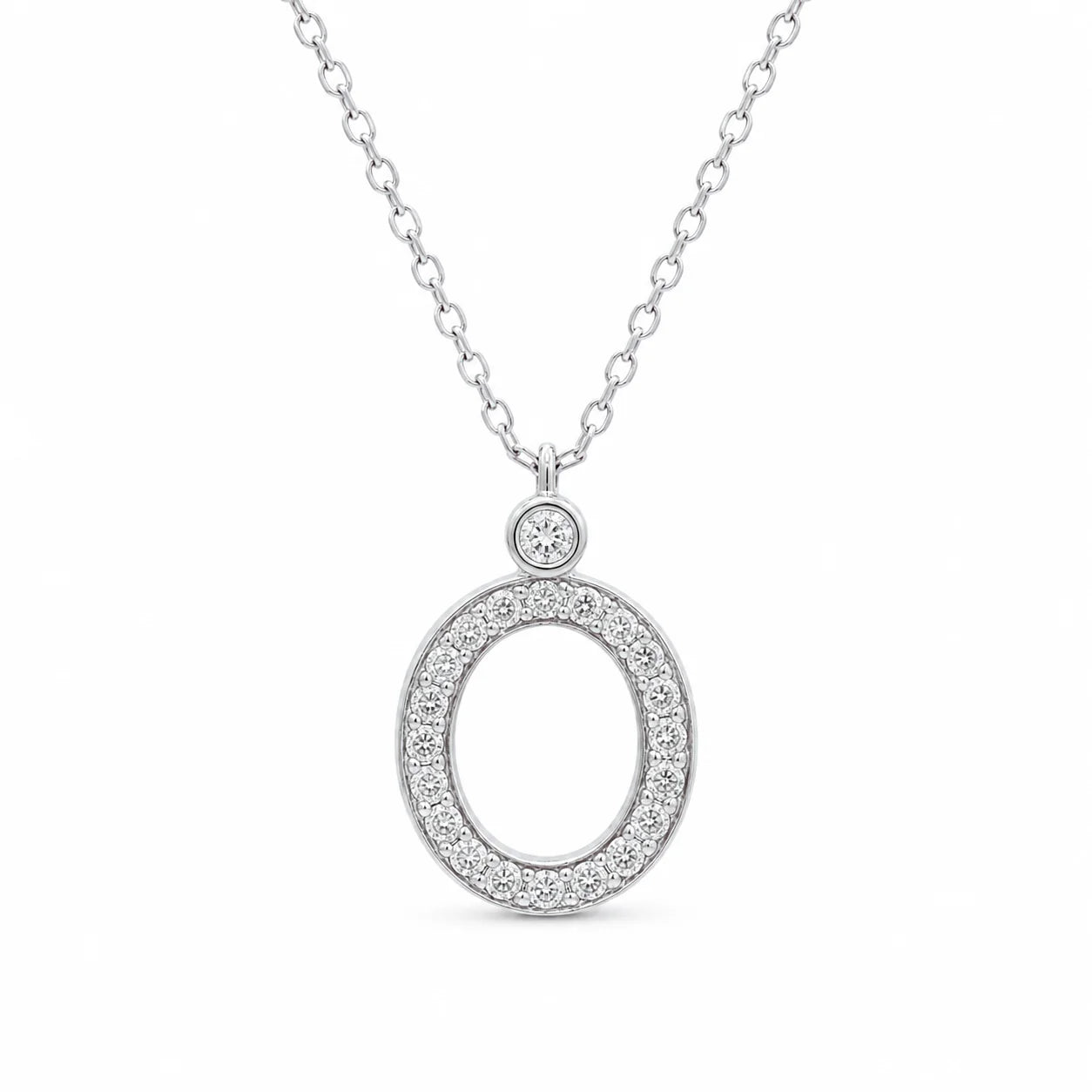 Silver necklace with an oval pendant on a white background