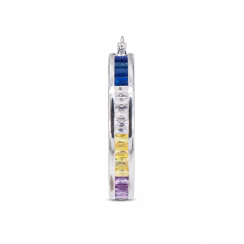 Multicolored hoop earrings on a white background