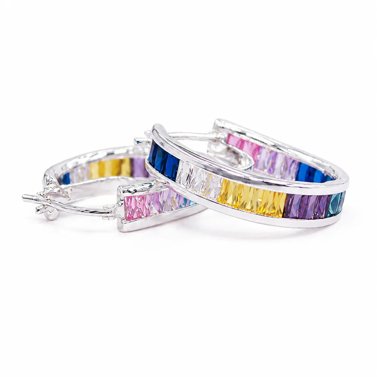 Multicolored hoop earrings on a white background