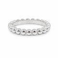 Silver beaded ring on a white background