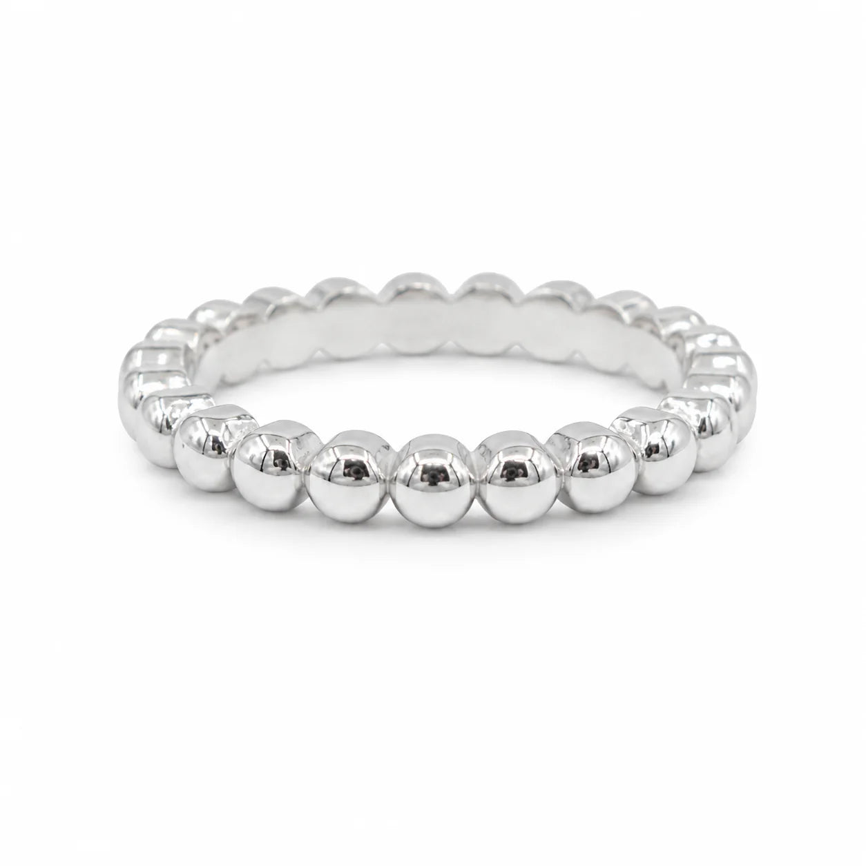 Silver beaded ring on a white background