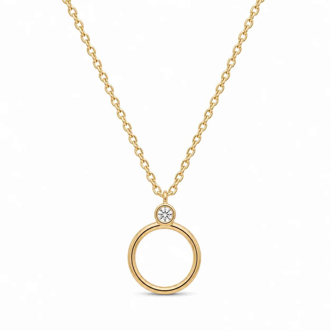 Gold necklace with a circular pendant on a white background