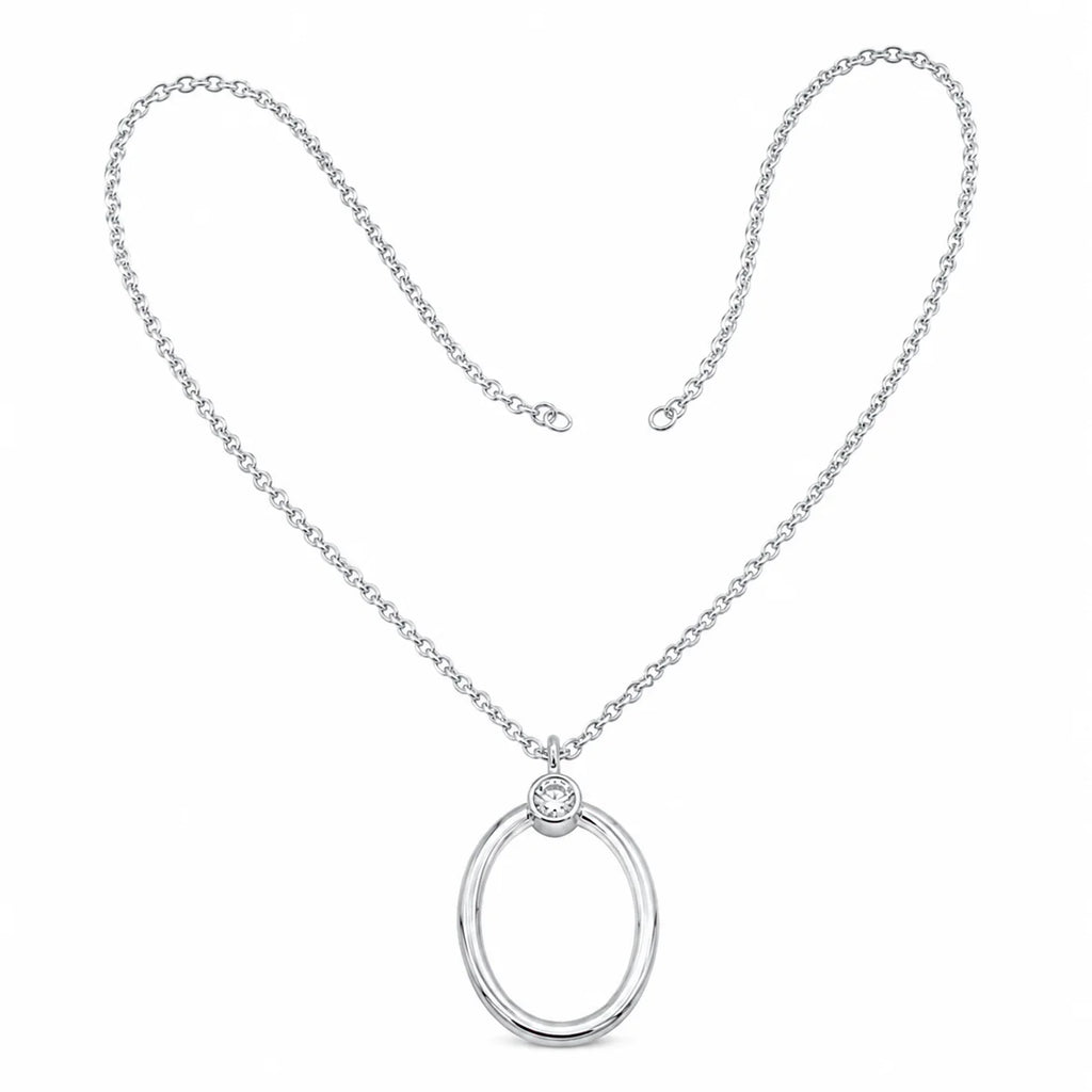 Silver necklace with a circular pendant on a white background