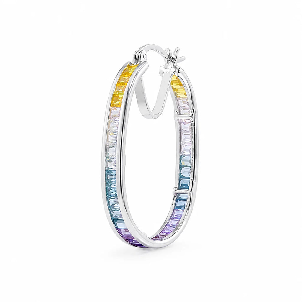 Multicolored hoop earrings on a white background