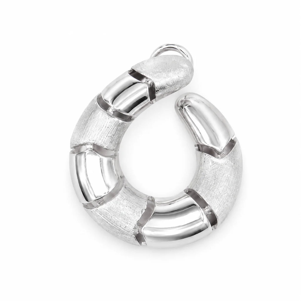 Silver horseshoe-shaped earring on a white background