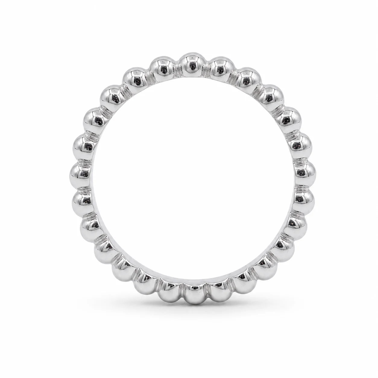 Silver beaded ring on a white background