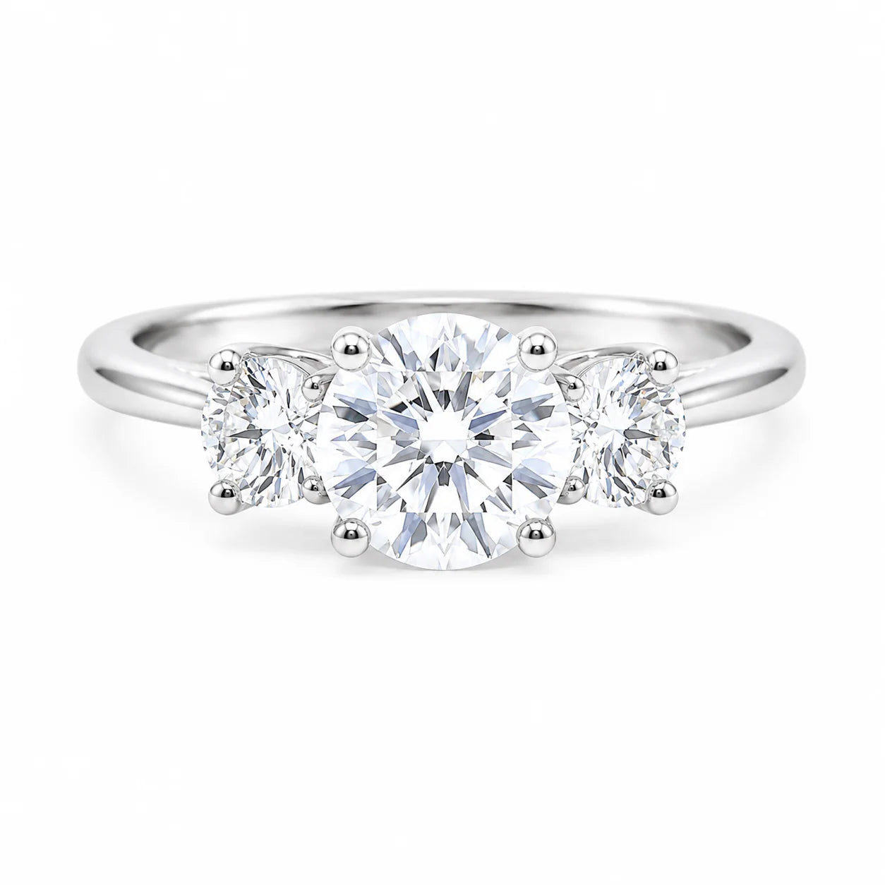 Three-stone diamond ring on a white background