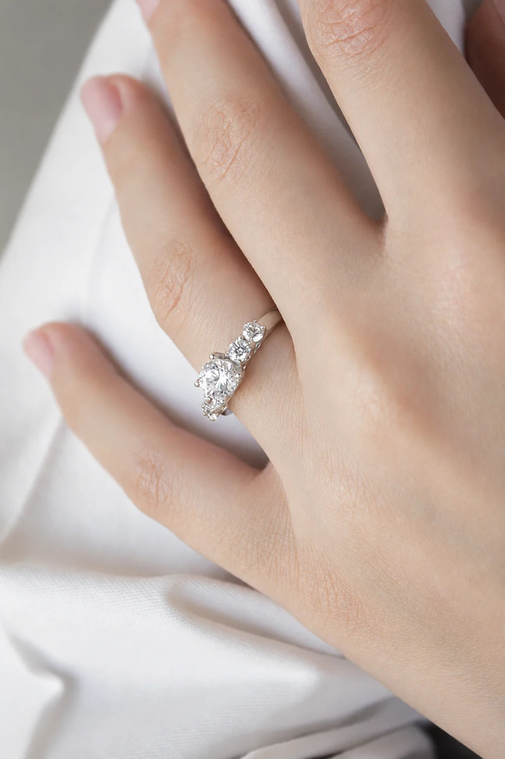 5 diamond close up silver ring
