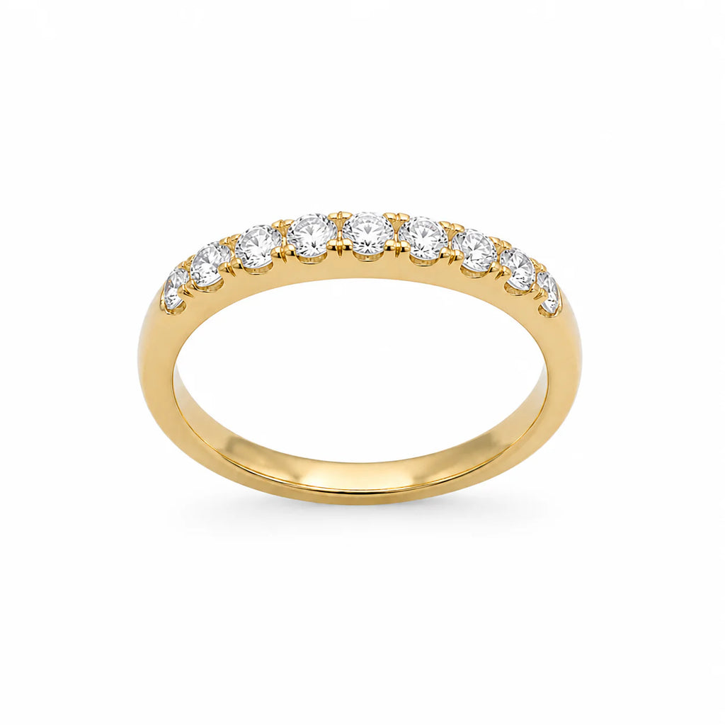 Gold ring with diamonds on a white background