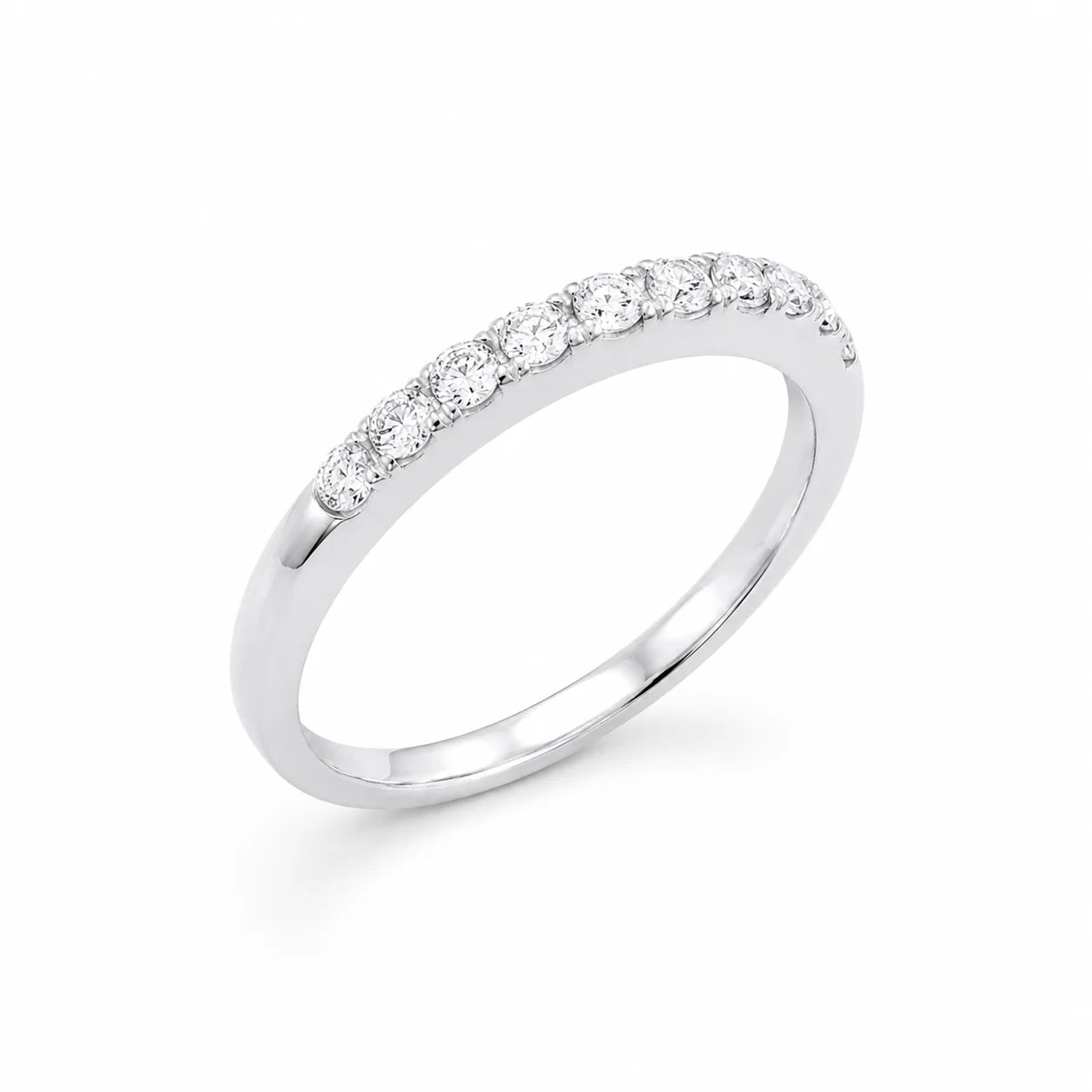Silver ring with small diamonds on a white background